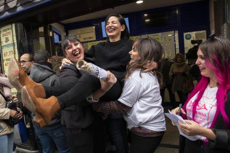 Lottery winners celebrating an administration
