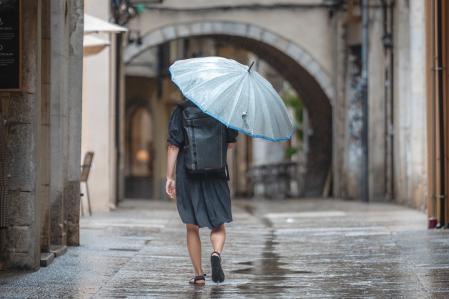 View of a street of Girona center during rains